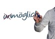 Foto: Mann schreibt un-möglich Mann schreibt un-möglich