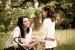Nostalgy - mother with her child outdoors