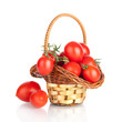 Photo: Cherry tomatoes in a basket, isolated on white Cherry tomatoes in a basket, isolated on white