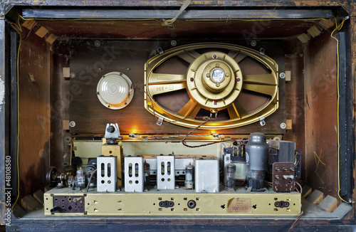 Photo: inside of old vintage radio inside of old vintage radio