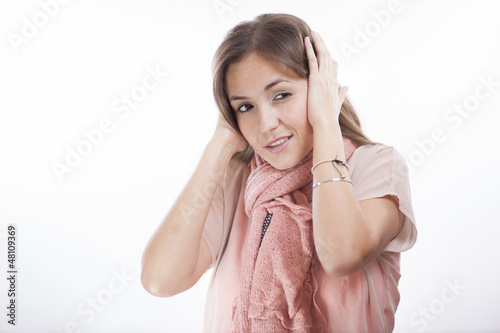 Photo: Young woman annoyed by so much noise Young woman annoyed by so much noise
