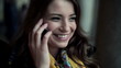 Beautiful woman talking on cellphone in city, steadicam shot