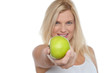 Glamorous blonde offering you juicy green apple