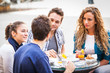 Group of Friends Having a Traditional Italian Breakfast