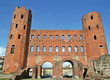 Roman gates Porta Palatina on blue sky