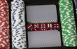 A photo of poker chips and cards in a briefcase
