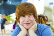 outdoor portrait of relaxed cute young boy