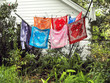 Colorful Bandanas Drying in the Sun on Old Clothesline
