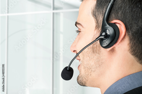 Photo: Businessman using an headset Businessman using an headset