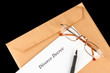 Divorce decree and envelope on black background