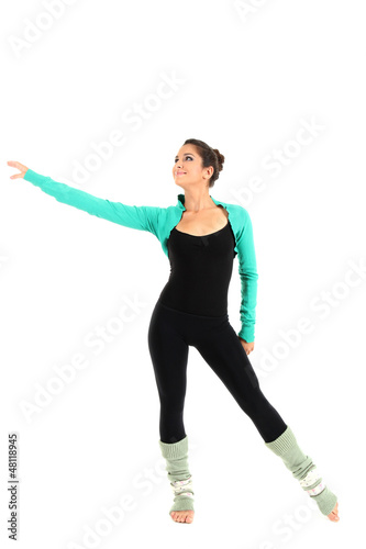 Photo: young beautiful brunette warming-up isolated on white young beautiful brunette warming-up isolated on white