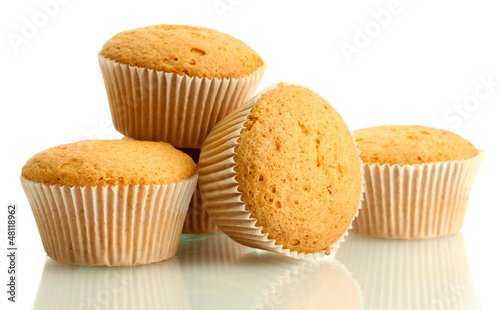 Photo: tasty muffin cakes, isolated on white tasty muffin cakes, isolated on white