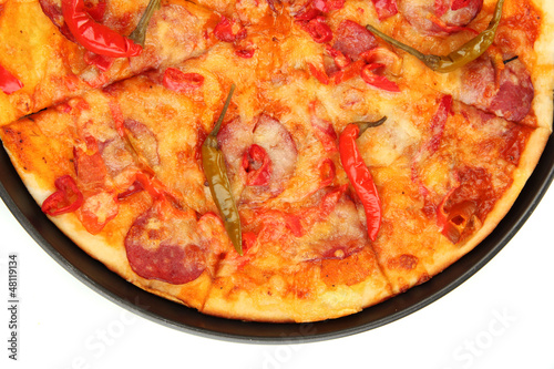 Photo: tasty pepperoni pizza in pan isolated on white tasty pepperoni pizza in pan isolated on white