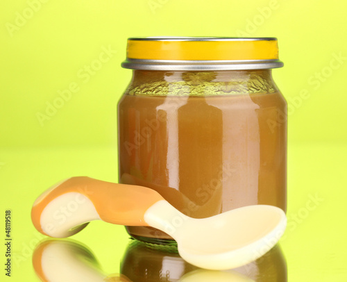 Photo: Useful and tasty baby food with beige small spoon Useful and tasty baby food with beige small spoon