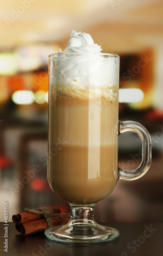 Photo: Fragrant coffee latte in glass cup with vanilla pods, Fragrant coffee latte in glass cup with vanilla pods,