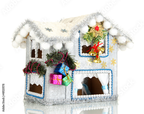 Photo: Decorated Christmas house isolated on white Decorated Christmas house isolated on white