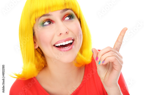 Photo: Yellow hair woman pointing up Yellow hair woman pointing up