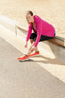 Happy woman jogger training in the park. Healthy lifestyle and p