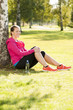 Happy woman jogger training in the park. Healthy lifestyle and p