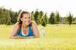 Happy woman jogger training in the park. Healthy lifestyle and p