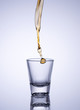 Foto: Glass of whiskey with splash Glass of whiskey with splash
