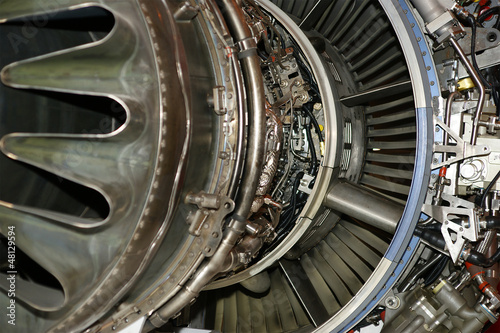 Photo: Large jet engine detail viewed from below Large jet engine detail viewed from below