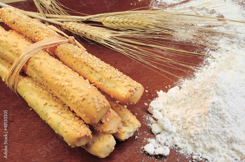 Photo: Breadsticks and wheat Breadsticks and wheat