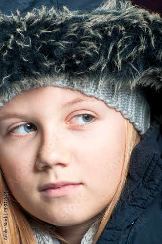 Photo: Girl in winter clothes Girl in winter clothes