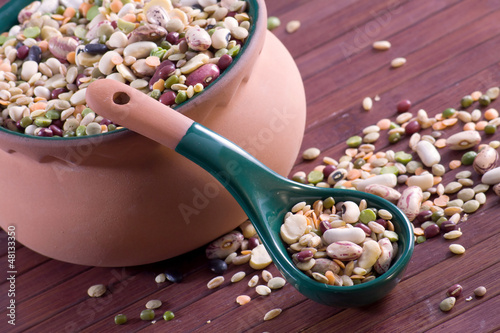 Photo: Mix of legumes in an earthenware jar Mix of legumes in an earthenware jar