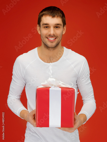 Photo: handsome man with a gift handsome man with a gift