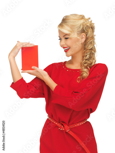 Photo: lovely woman in red dress with note card lovely woman in red dress with note card