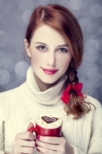 Photo: Redhead girl with coffe. St. Valentine Day Redhead girl with coffe. St. Valentine Day