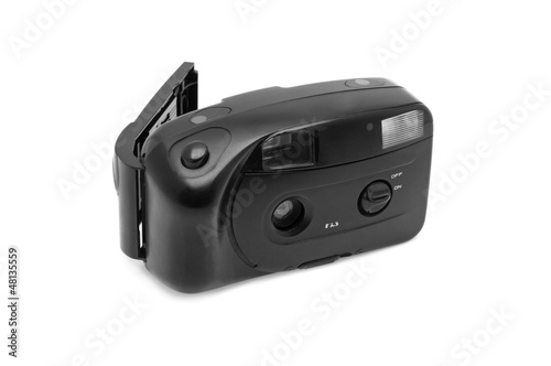 Photo: obsolete film camera isolated on a white background obsolete film camera isolated on a white background