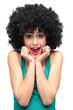 Excited woman wearing afro wig