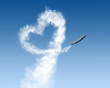 heart shape track from plane on blue
