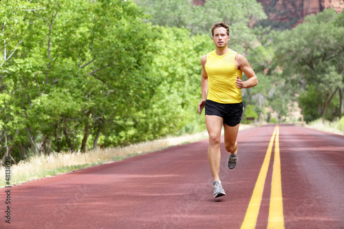 Photo: Runner man running on road Runner man running on road