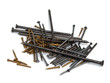 Building nails of different lengths on white background.