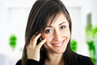 Smiling businesswoman on the phone