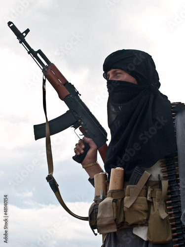 Photo: Muslim rebel with AK assault rifle Muslim rebel with AK assault rifle
