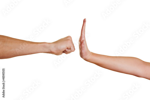 Photo: Hand stoppt Faust Hand stoppt Faust