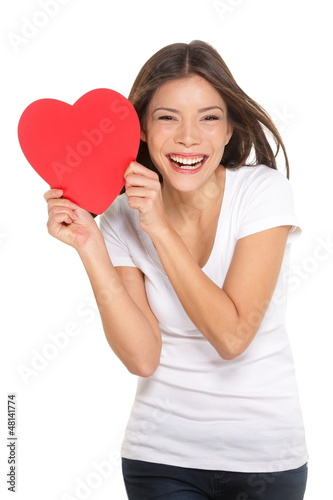 Photo: Woman showing heart Woman showing heart