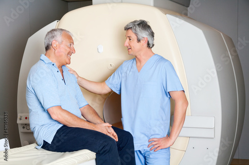Photo: Senior Patient With Technician Senior Patient With Technician