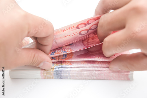 Photo: man counting RMB man counting RMB