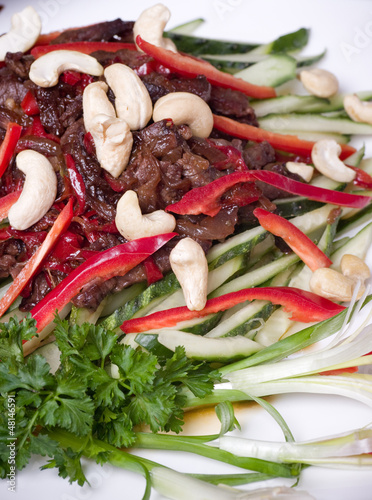 Photo: Tasty salad with roasted meat and vegetables Tasty salad with roasted meat and vegetables