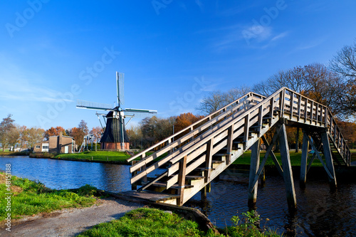 Photo: Dutch windmill and bridge Dutch windmill and bridge
