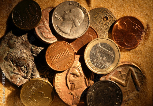 Photo: Coins In Sand Coins In Sand