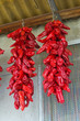 Red hot peppers hanging on the wall.