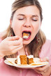Photo: Woman eating cake Woman eating cake