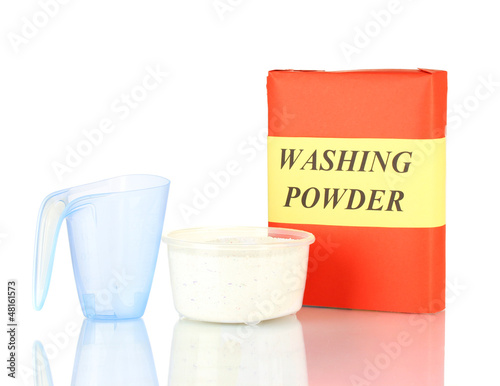 Photo: Box of washing powder with blue measuring cup, isolated on Box of washing powder with blue measuring cup, isolated on