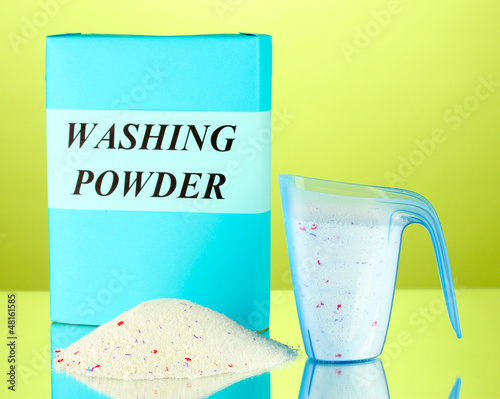 Photo: Box of washing powder with blue measuring cup, Box of washing powder with blue measuring cup,